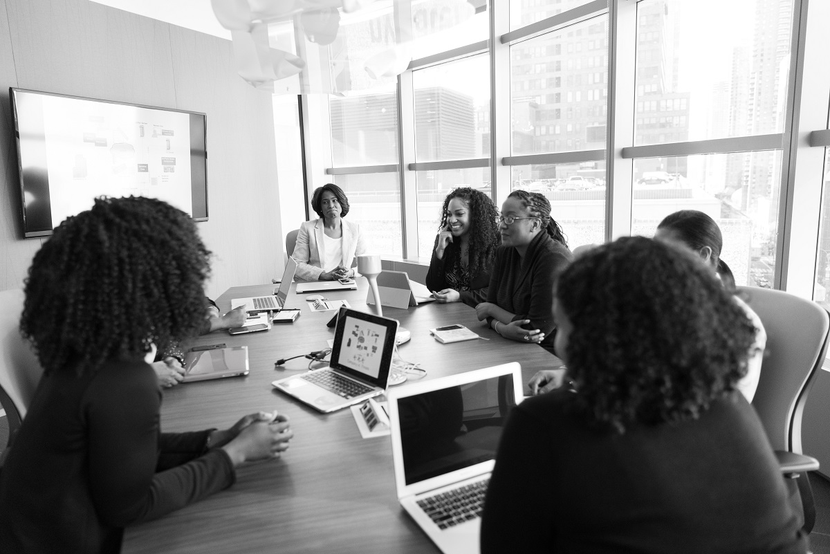 team sitting around a table in an office